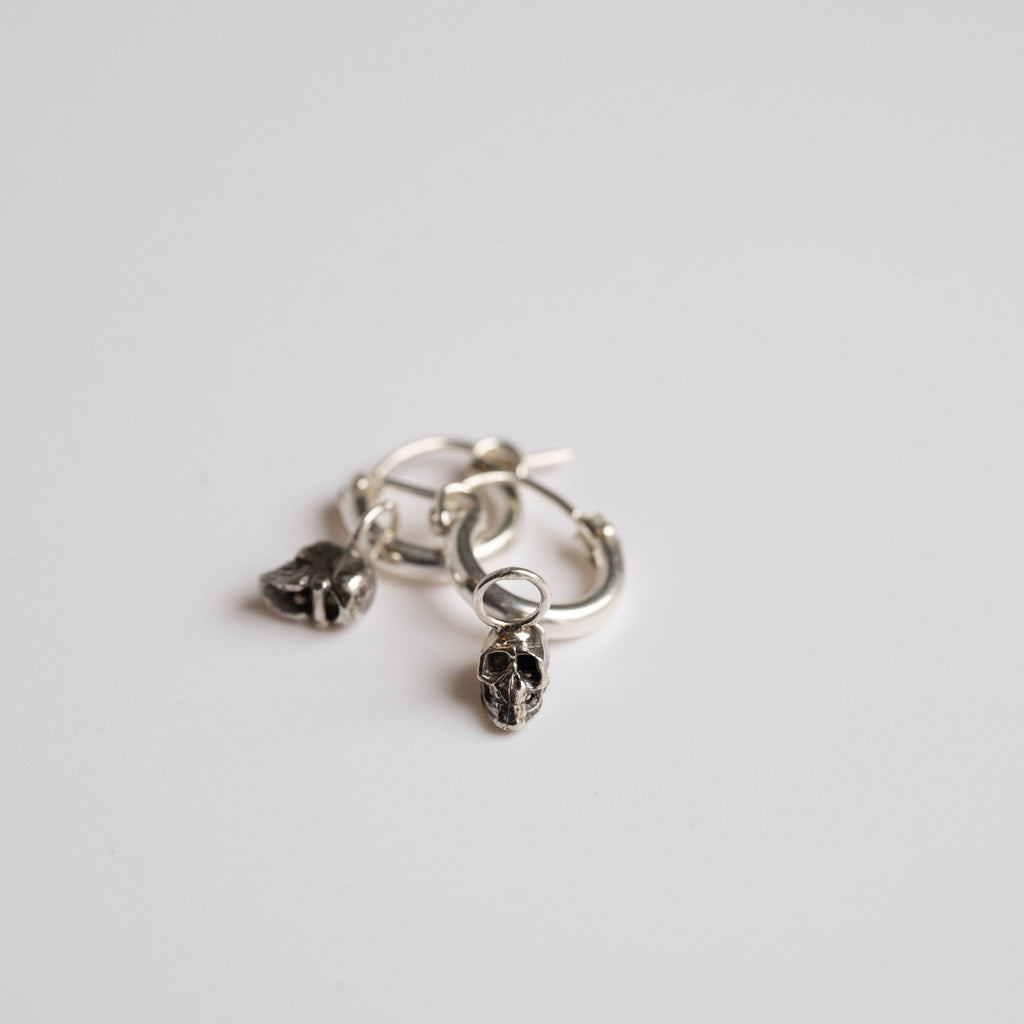 sterling silver dainty skull hoop earrings